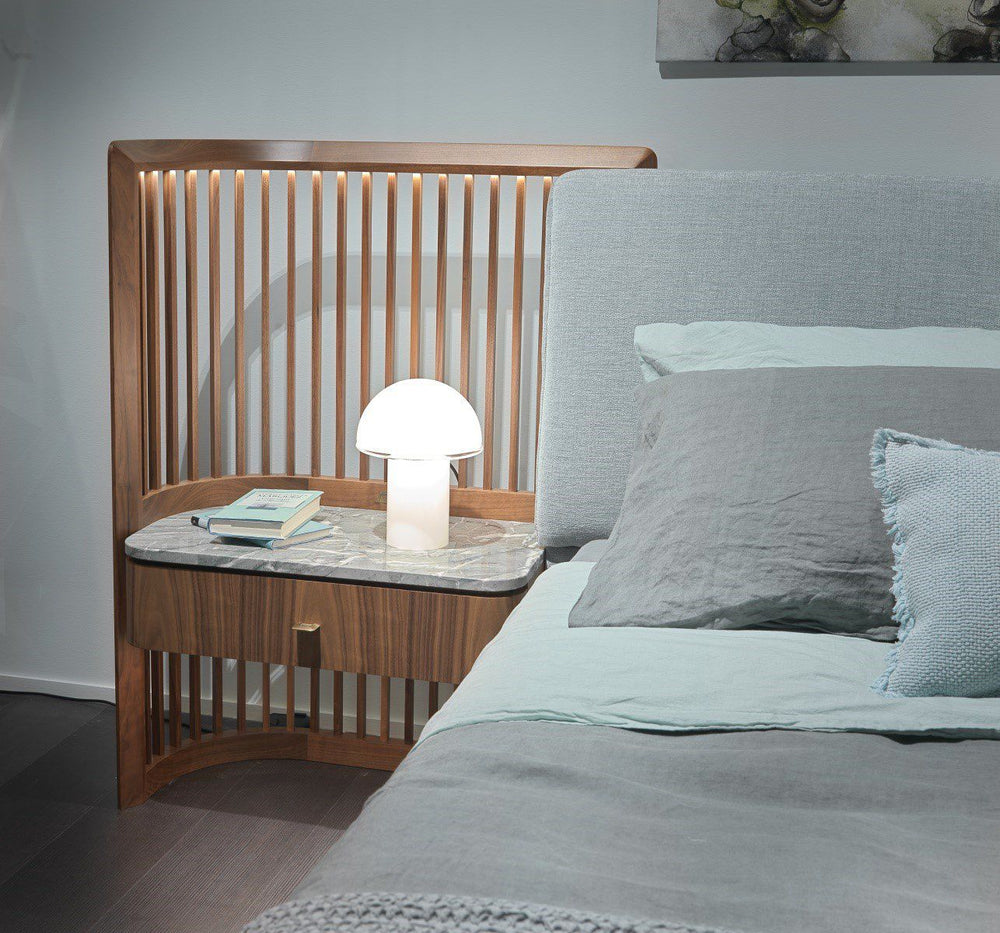 Bed with built-in nightstands and lighting